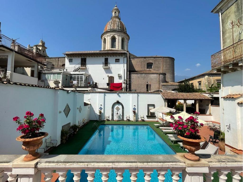 Don Camillo Suites Рипосто Экстерьер фото
