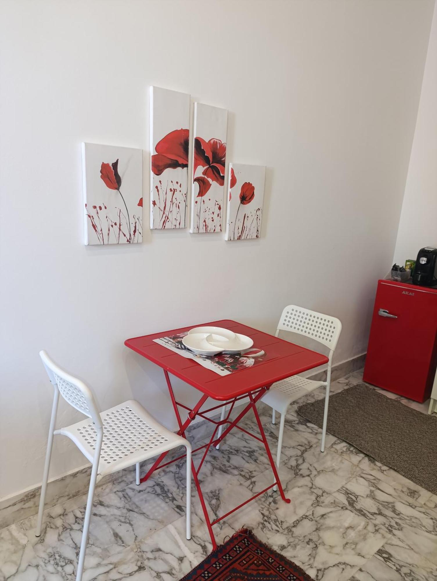 Don Camillo Suites Рипосто Номер фото